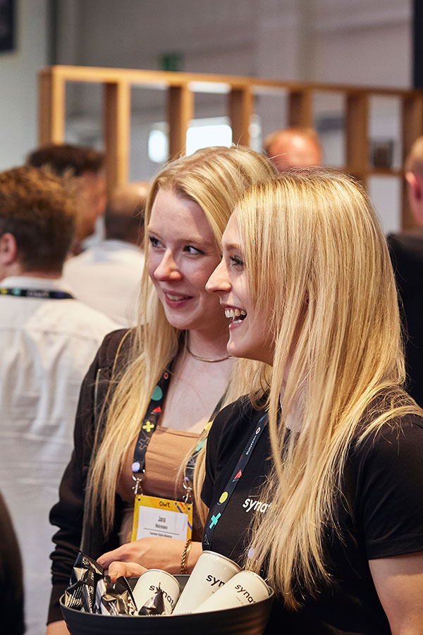 Two colleagues at a trade fair